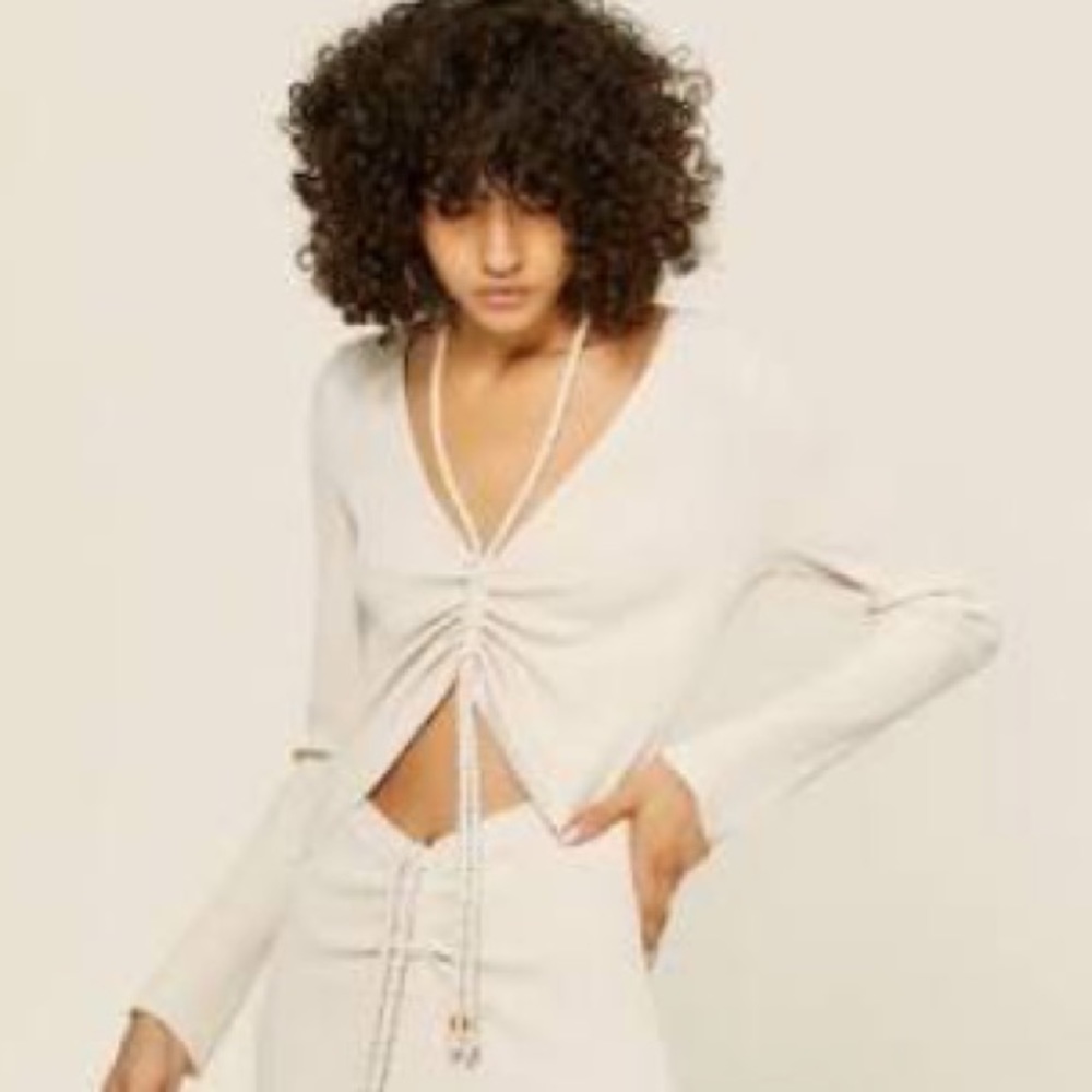 Nicholas the label top
